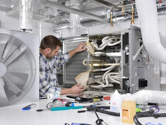 Warwick Air Duct Cleaning specialist performing precision AC coil cleaning in Warwick