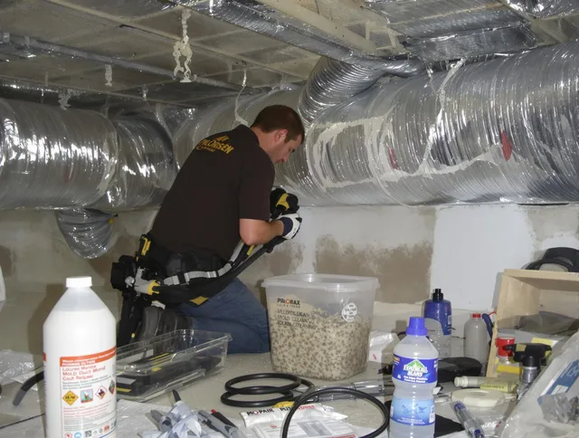 Warwick Air Duct Cleaning specialist performing professional mold removal from air ducts in Warwick
