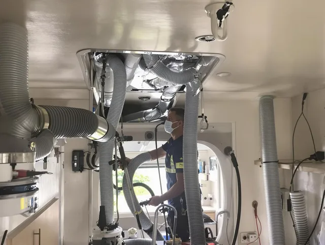 Warwick Air Duct Cleaning specialist performing precise mobile home duct cleaning in Warwick