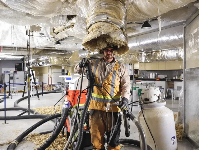 Professional vacuum insulation removal by Warwick Air Duct Cleaning expert in Warwick